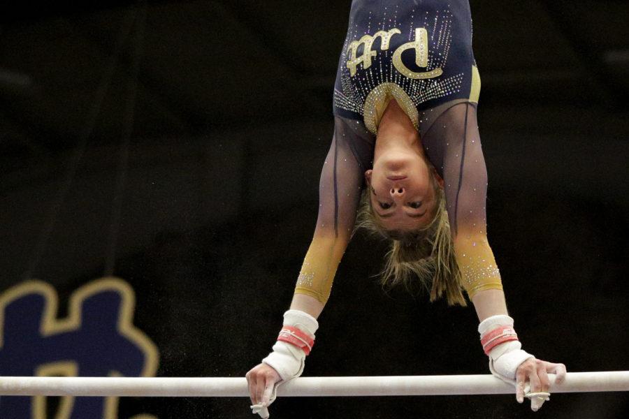 Senior Taylor Laymon tied with sophomore Lucy Jones for ninth on bars with a score of 9.850 at the NCAA Regional Championship Saturday. (Photo by Thomas Yang | Visual Editor)
