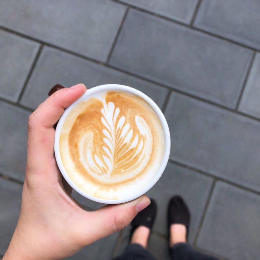 One barista shows off her latte art outside Crazy Mocha Sewickley. (Photo courtesy of Alexa Manko)