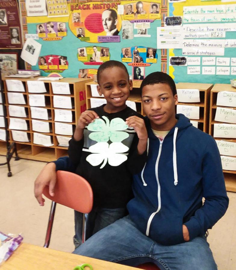 Pitt student Malcolm meets with his little, Chauncey, at school to play games. 