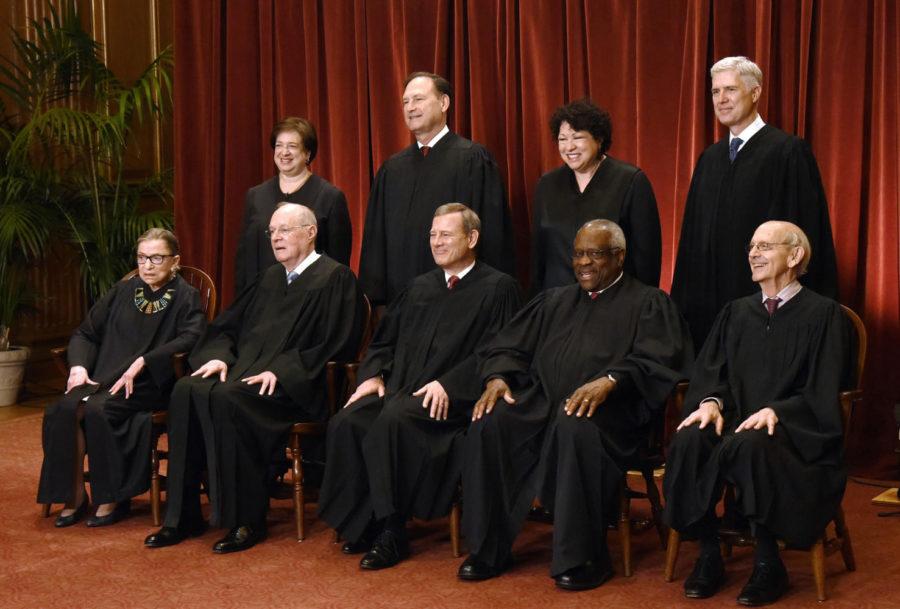Members of the U.S. Supreme Court pose for a group photograph at the Supreme Court building on June 1, 2017, in Washington, D.C. Front row, seated from left, Associate Justice Ruth Bader Ginsburg, Associate Justice Anthony M. Kennedy, Chief Justice of the United States John G. Roberts, Associate Justice Clarence Thomas, and Associate Justice Stephen Breyer. Standing behind from left, Associate Justice Elena Kagan, Associate Justice Samuel Alito Jr., Associate Justice Sonia Sotomayor, and Associate Justice Neil Gorsuch. (Olivier Douliery/Abaca Press/TNS)