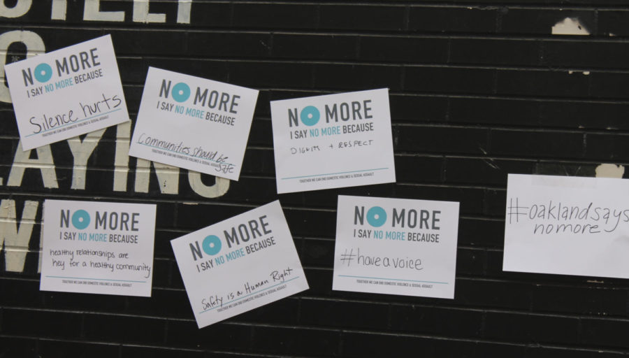 Oakland Says No More, a campaign which hopes to end workplace sexual harassment and violence, encouraged supporters to sign their petition at an event hosted on Oakland Avenue Tuesday evening. (Photo by Samuel Weber | Staff Writer)