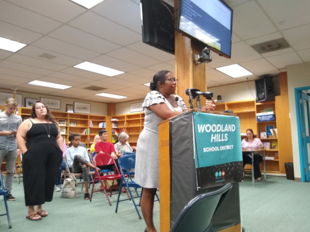 Darnika Reed, 38, of Wilkins Township speaks at the hearing. “It’s still police brutality if it’s in khakis and a polo shirt,” she said. (Photo by Kieran Mclean | Contributing Writer)
