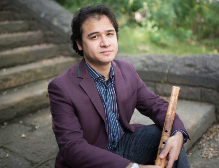 Devon Osamu Tipp, a Pitt PhD student and winner of the 2018 Japanese Nationality Room scholarship, plays the Shakuhachi, a Japanese end-blown bamboo flute. (Image via University of Pittsburgh)