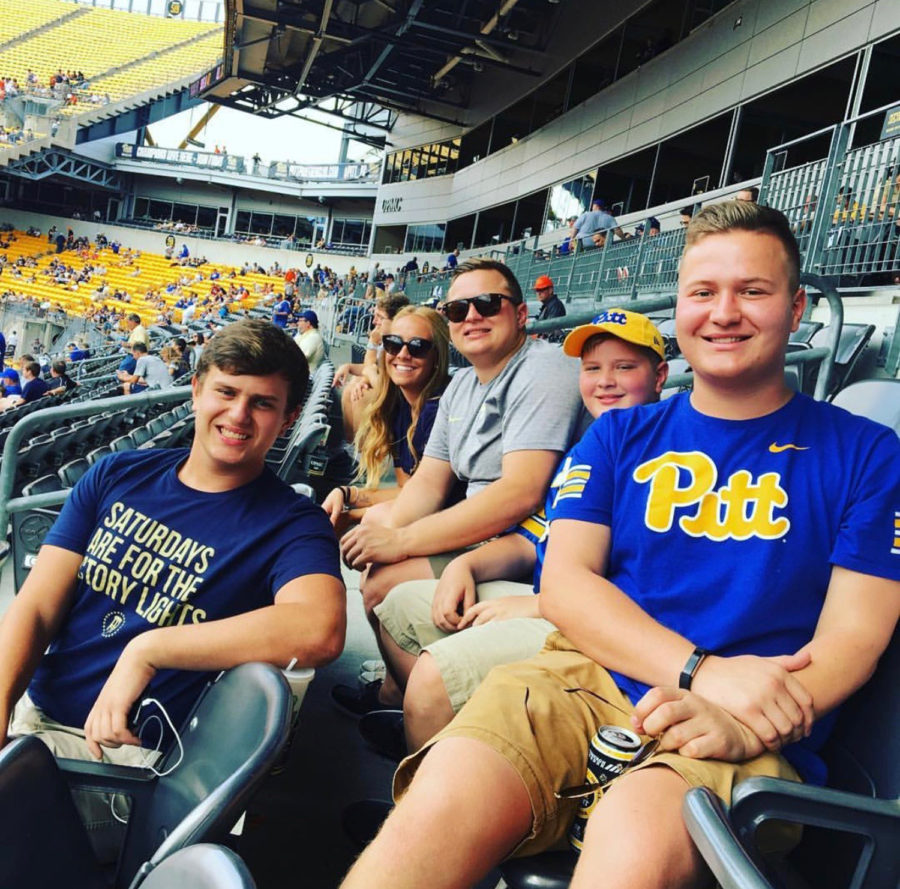 (From left to right) Pierce, Joel’s girlfriend Kati Fischer, Joel, Reese and Gavin Yahner sit in the stands at Heinz Field.