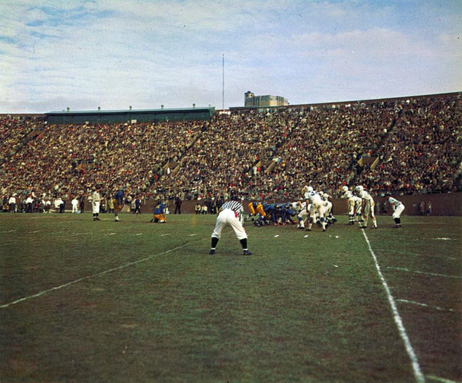 The Pitt and Penn State football teams face off in Pitt Stadium on November 27, 1958. (Image via Wikimedia Commons)
