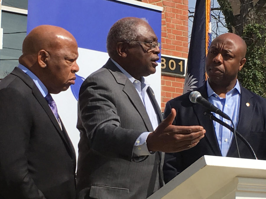 U.S. Reps. John Lewis (D-Ga.), Jim Clyburn, (D-S.C.), and U.S. Sen. Tim Scott, (R-S.C.), speak to reporters kicking off the Faith and Politics Institute civil-rights pilgrimage in South Carolina on March 18, 2016, in Columbia, S.C. (Jamie Self/The State/TNS)