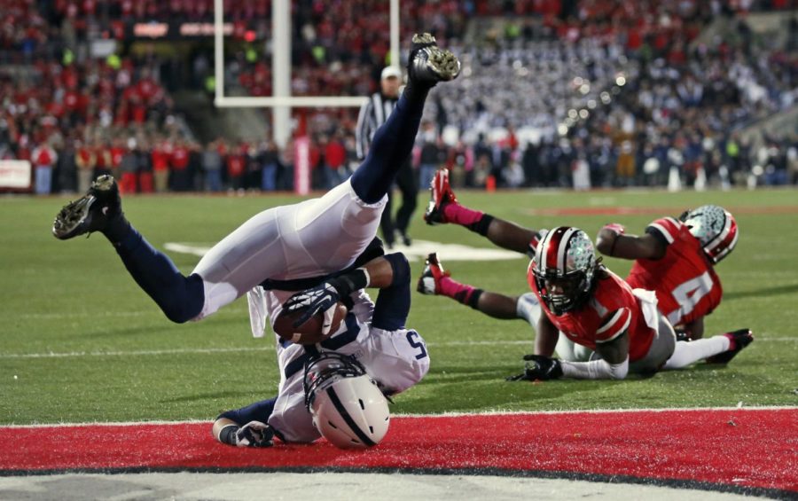 Penn State Nittany Lions wide receiver Brandon Felder (85) catches a touchdown behind Ohio State Buckeyes cornerback Bradley Roby (1) and safety C.J. Barnett (4) during the first half at Ohio Stadium in Columbus, Ohio, on Saturday, Oct. 26, 2013. (Adam Cairns/Columbus Dispatch/MCT)