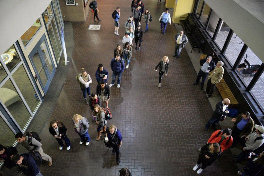 Students line up to vote in Posvar Hall in November 2016. About 80 people cast their vote at the polling station in November 2017.