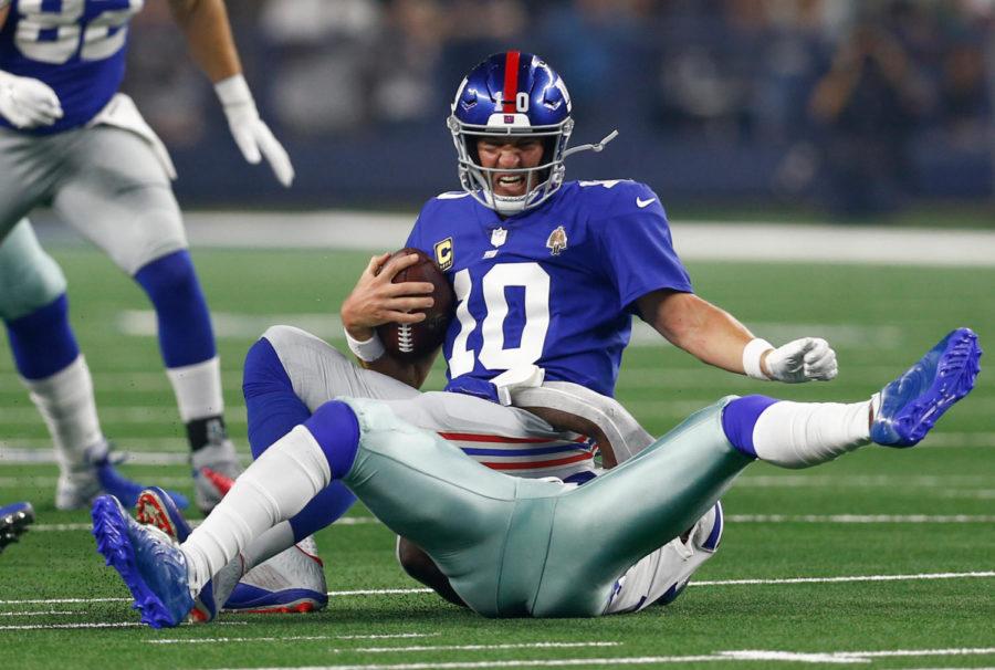 New+York+Giants+quarterback+Eli+Manning+%2810%29+is+sacked+for+a+loss+by+Dallas+Cowboys+defensive+back+Kavon+Frazier+%2835%29+during+the+first+half+on+Sept.+16+at+AT%26T+Stadium+in+Arlington%2C+Texas.+%28Jim+Cowsert%2FFort+Worth+Star-Telegram%2FTNS%29%0A