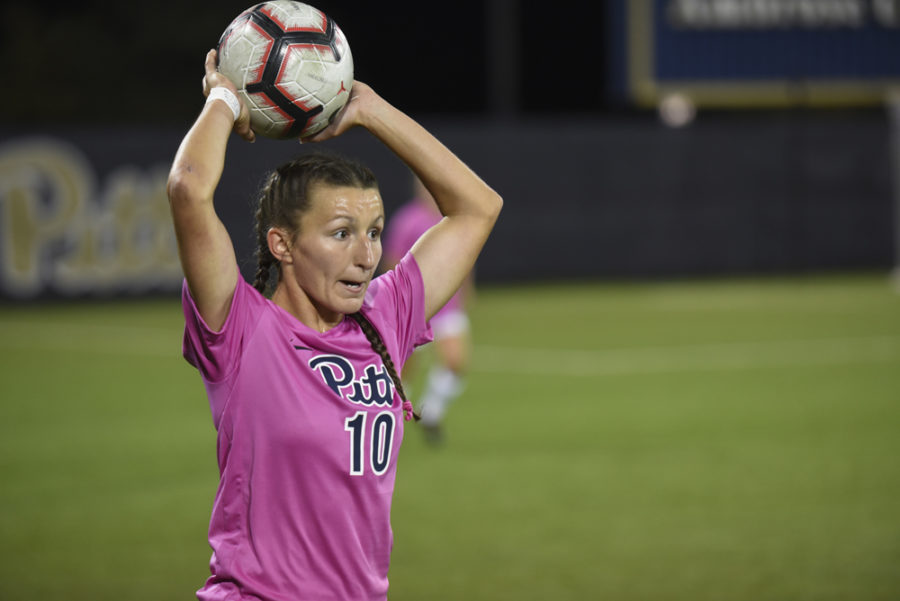 unior defender Cheyenne Hudson prepares to throw the ball in against Florida State Oct. 18. The Panthers lost the match, 4-0. 
Knox Coulter | Staff Photographer
