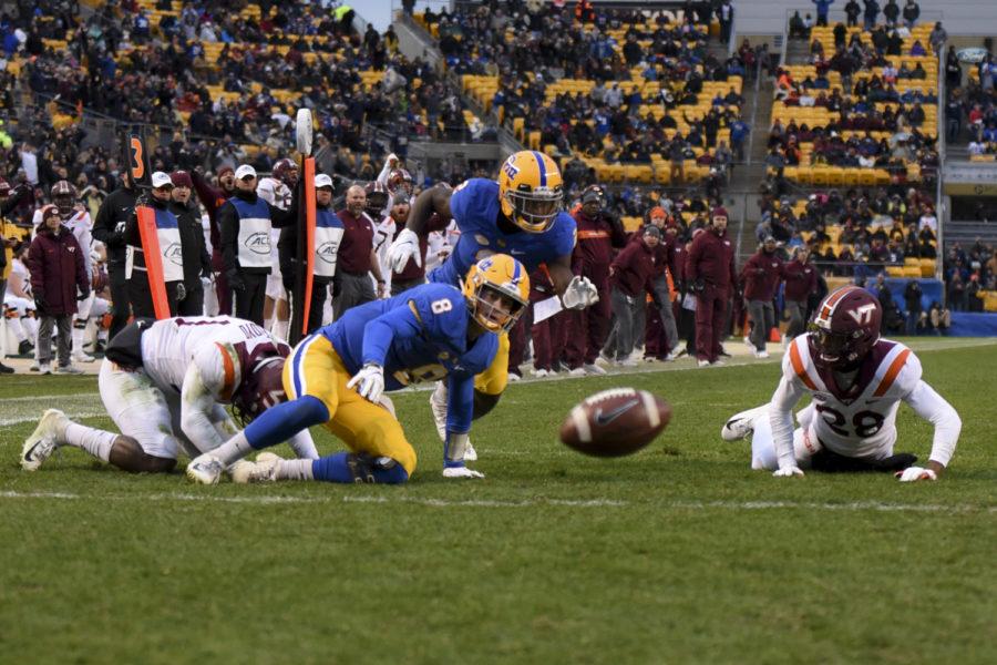 Sophomore quarterback Kenny Pickett fumbles the ball during Pitt’s game against Virginia Tech earlier this month.