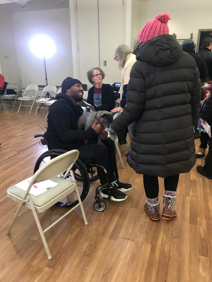 Leon Ford (left) speaks with East Liberty community members at his campaign’s “A Seat at the Table” event Wednesday evening. Ford plans to run for the Pittsburgh city council’s ninth district seat on platform centered around community engagement.
