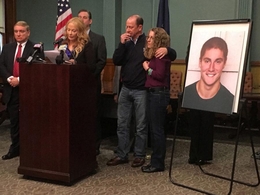 Stacy Parks Miller, former Centre County district attorney, with James and Evelyn Piazza, parents of Timothy Piazza, 19, of Readington Township, New Jersey, during a news conference at the Bellefonte courthouse. 

