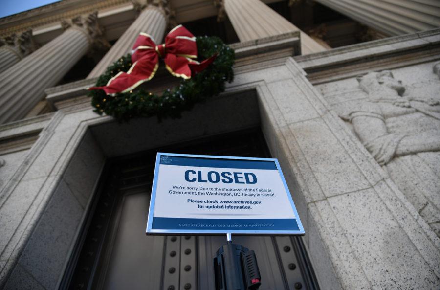 A+sign+announcing+closure+of+the+National+Archives+due+to+a+partial+government+shutdown+is+displayed+on+Dec.+24%2C+2018%2C+in+Washington%2C+D.C.%0A