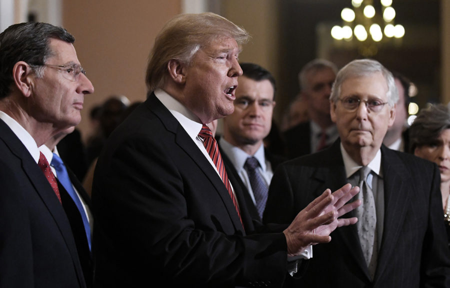 U.S. President Donald Trump, center, talks to the press after the Republican luncheon at the U.S. Capitol Building on Wednesday, Jan. 9, 2019 in Washington, D.C. (Olivier Douliery/Abaca Press/TNS)