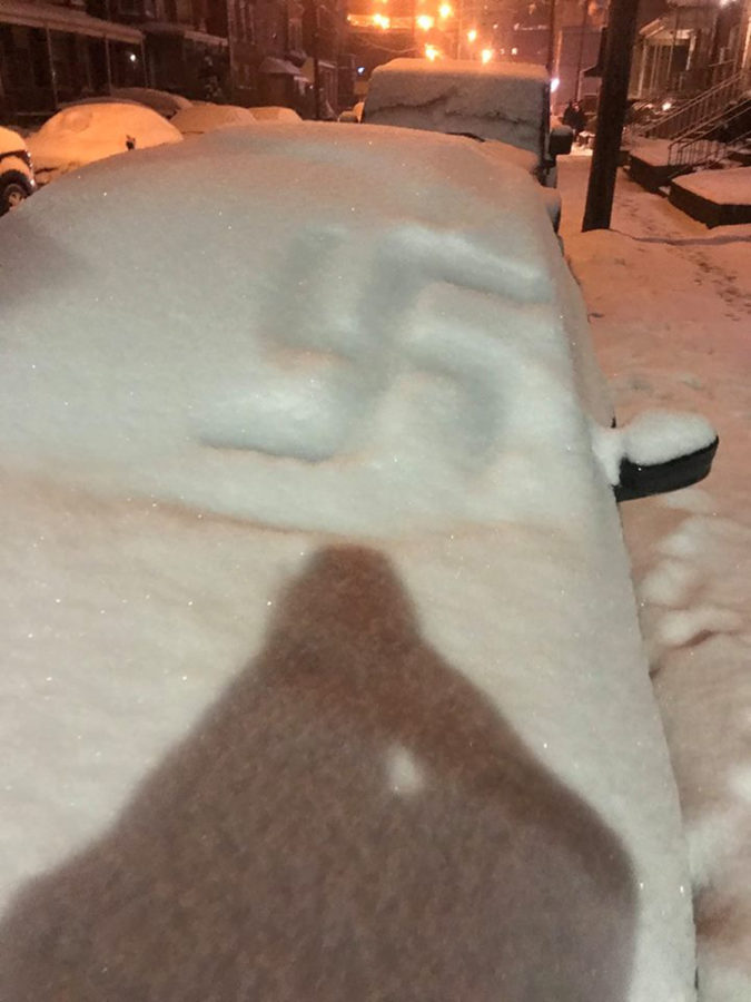 More than a dozen swastikas were drawn in the snow on car hoods last January on Meyran Avenue. 