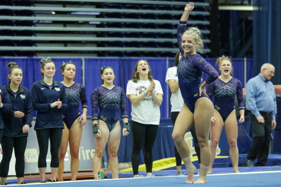 Senior Charli Spivey completes her floor performance during Pitt’s 196.225-195.175 victory over New Hampshire on Jan. 20, 2018.
