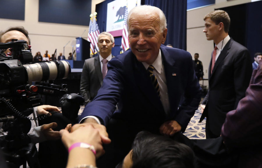 Former Vice President Joe Biden shakes hands with supporters after speaking at a political rally at Cal State Fullerton on October 4, 2018, in Fullerton, Calif. 