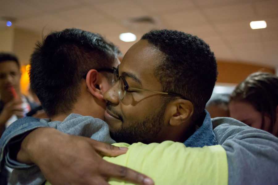 SGB presidential candidates Zechariah Brown (front) and Albert Tanjaya hug after the announcement of Tuesdays election results.