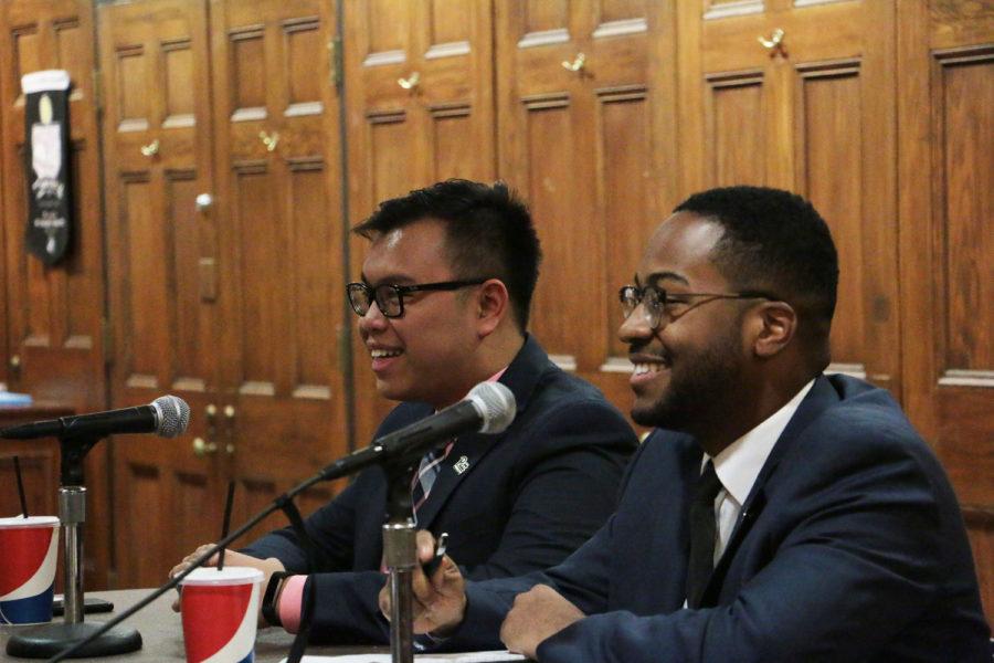 SGB presidential candidates Albert Tanjaya (left) and Zechariah Brown (right) discuss the funding process for Pitt’s clubs at Monday evening’s SGB Presidential Debate.
