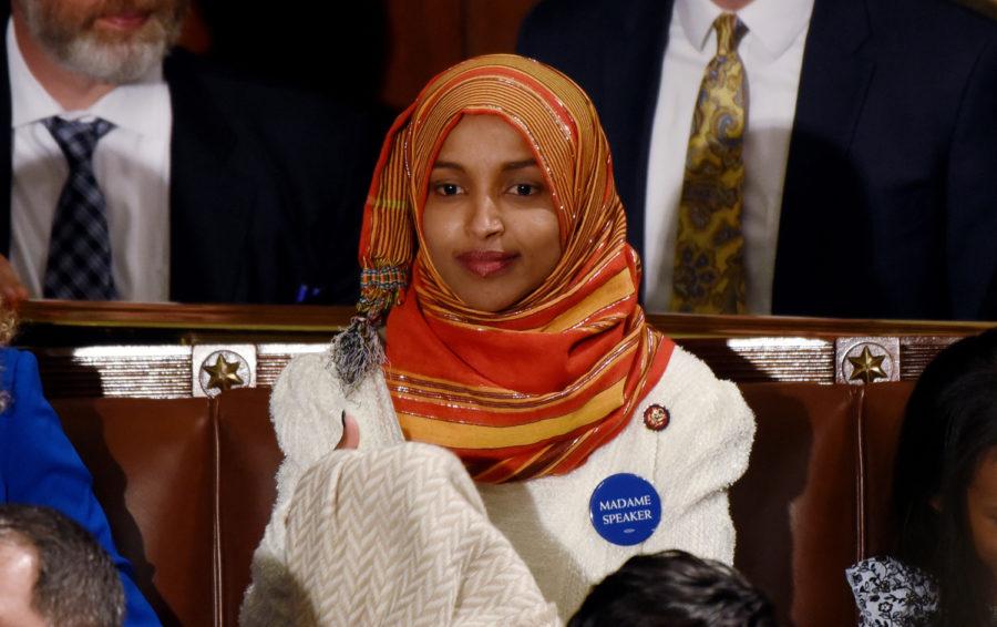 Ilhan+Omar%2C+D-Minn.+%E2%80%94+one+of+two+Muslim+women+recently+elected+to+the+House+of+Representatives+%E2%80%94+awaits+the+start+of+the+116th+Congress+on+the+floor+of+the+U.S.+House+of+Representatives+at+the+U.S.+Capitol+on+Jan.+3+in+Washington%2C+D.C.%0A