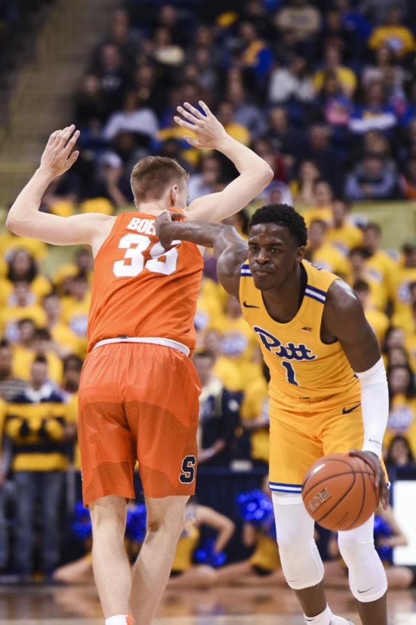First-year point guard Xavier Johnson (1), pictured here against Syracuse on Feb. 2, scored nearly a third of Pitt’s 76 points during Pitt’s loss against Wake Forest Tuesday night. 