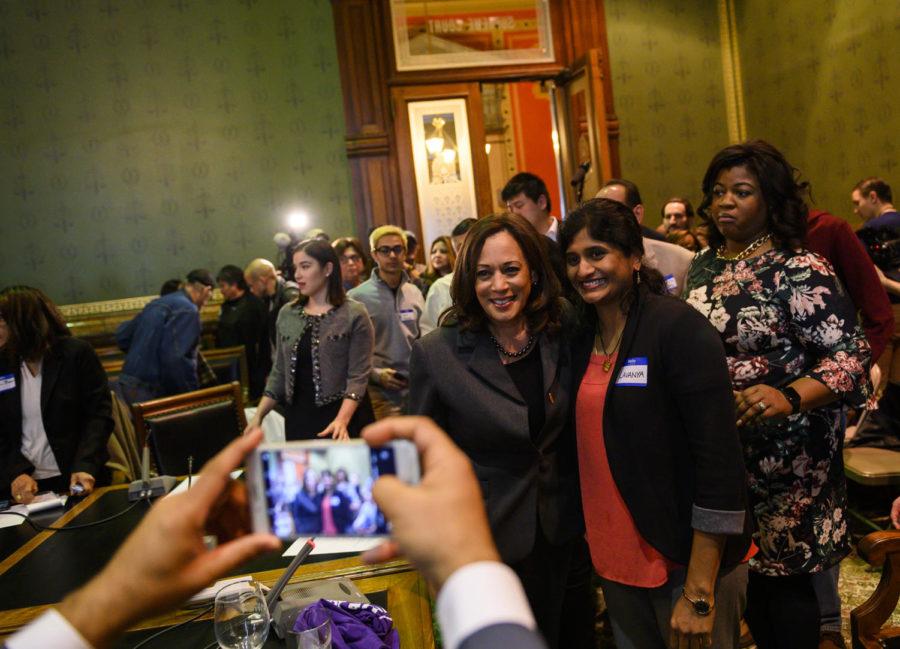 Democratic presidential candidate Sen. Kamala Harris (D-Calif.) poses for a photograph after speaking to the Asian and Latino Coalition at the Iowa Statehouse on February 23, 2019 in Des Moines, Iowa. (Stephen Maturen/Getty Images/TNS)