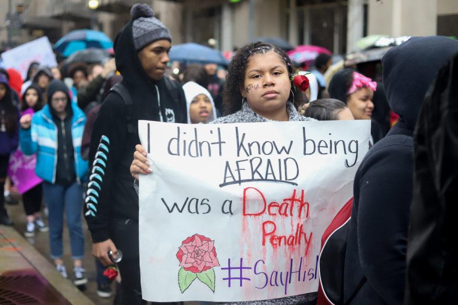 Demonstrators march through downtown Pittsburgh during Monday’s student walkout.
