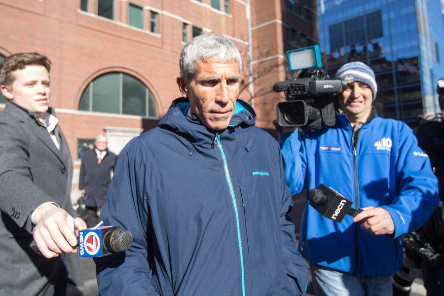 William “Rick” Singer leaves Boston Federal Court after being charged with racketeering conspiracy, money laundering conspiracy, conspiracy to defraud the United States and obstruction of justice last Tuesday in Boston. Singer is among several charged in an alleged college admissions scam.