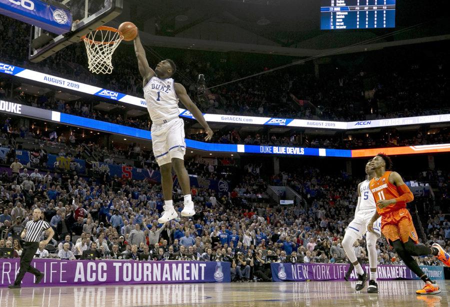 Dukes Zion Williamson (1) glides to the basket for a dunk in the opening minutes of play against Syracuse in the quarterfinals of the ACC Tournament at the Spectrum Center in Charlotte, North Carolina, on March 14. 