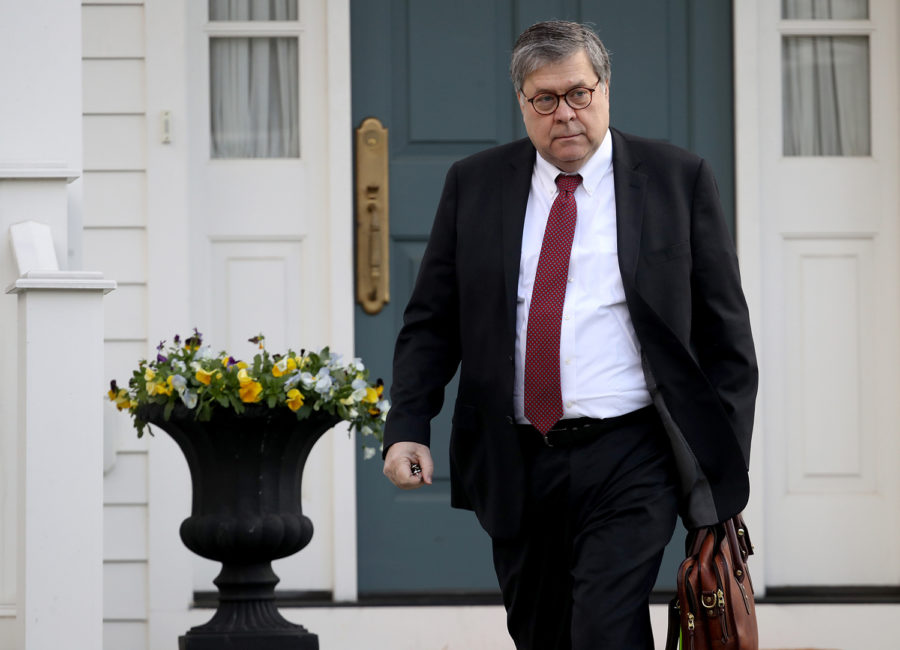 U.S. Attorney General William Barr departs his home on Friday, March 22, 2019, in McLean, Va.