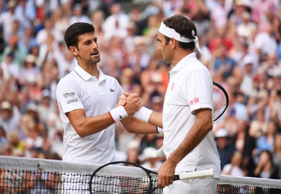 Novak+Djokovic+and+Roger+Federer+congratulate+each+other+after+their+historic+singles+championship+match+at+Wimbledon+on+Sunday.+Djokovic+prevailed%2C+7-6%2C+1-6%2C+7-6%2C+4-6%2C+13-12%2C+to+win+his+fifth+championship.%0A