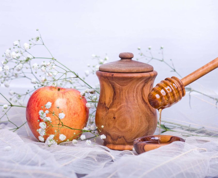 The Rosh Hashanah meal begins with the dipping of apple into honey and a special blessing for 