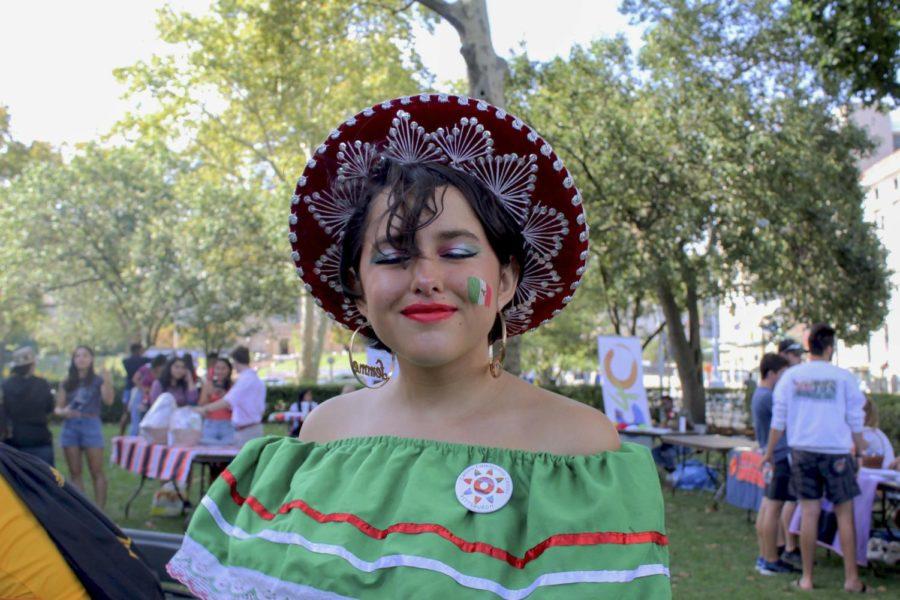 First-year Mia Moore poses in face paint and traditional dress at the kickoff to Hispanic Heritage Month. 