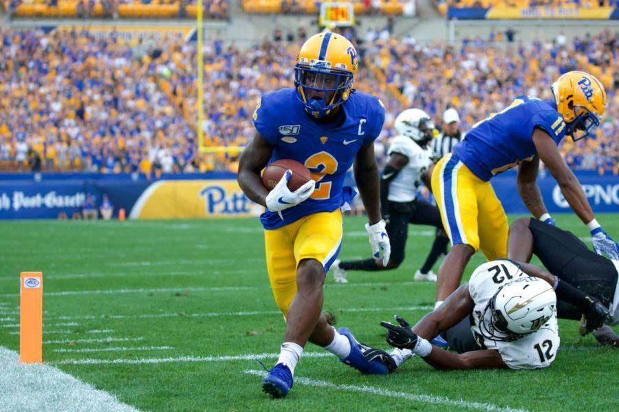 Senior+receiver+Maurice+Ffrench+makes+his+way+into+the+end+zone+for+Pitt%E2%80%99s+second+touchdown+against+UCF.+%0A