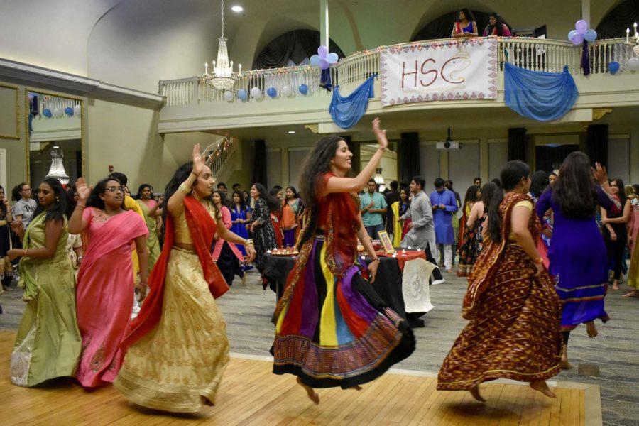 Participants dance in circles in the O’Hara Student Center ballroom during the Hindu Students Council’s Navaratri celebration.

