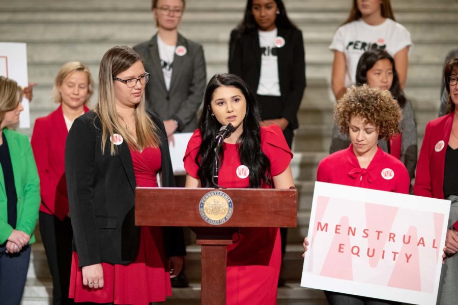 Lauren Risser, Kathleen Koesarie and Samantha Totoni (left to right) speak at Harrisburg on Tuesday to lobby for a bill that would require free menstrual products in Pennsylvania higher education facilities.
