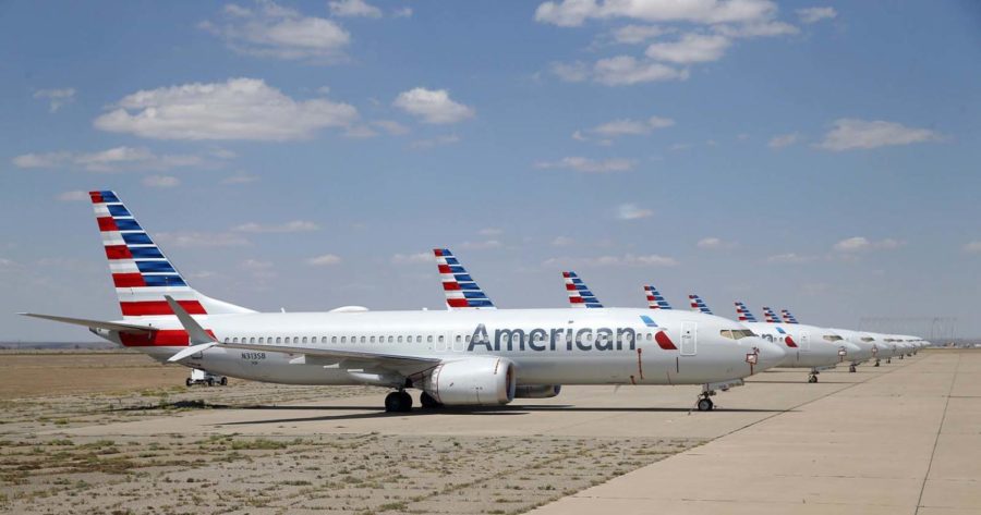 Eight of about a dozen grounded American Airlines Boeing 737 Max 8 aircraft are parked on a remote taxiway at Roswell International Air Center in Roswell, New Mexico, on Wednesday, Sept. 4. 