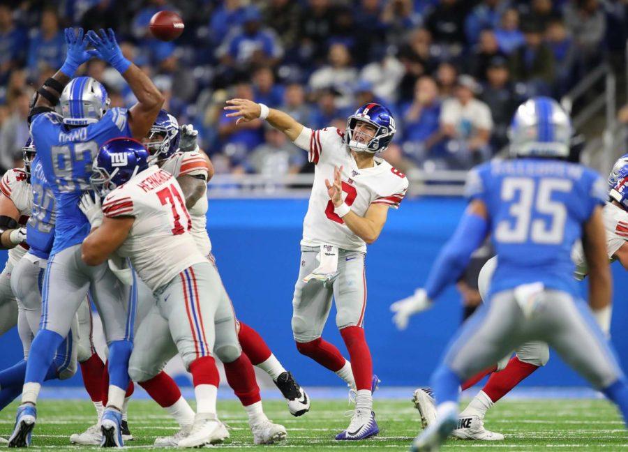 Daniel Jones (8) of the New York Giants throws a second-half pass against the Detroit Lions on Sunday, Oct. 27, at Ford Field in Detroit. The Lions won the game 31-26. 