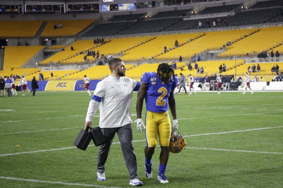 Senior Maurice Ffrench (2) walks off Heinz Field for the last time as a Pitt wide receiver. 