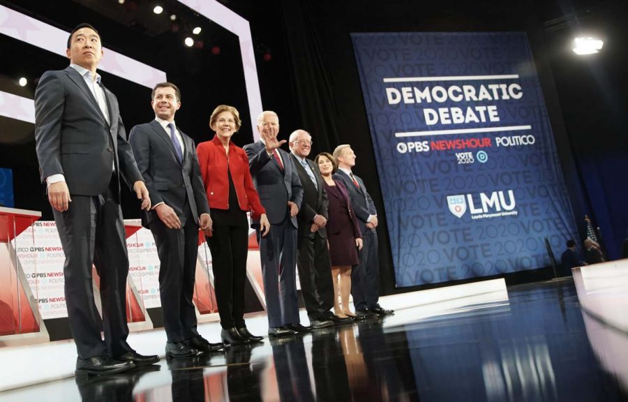 Democratic presidential hopefuls participate in the sixth Democratic primary debate of the 2020 presidential campaign season co-hosted by PBS NewsHour and Politico at Loyola Marymount University in Los Angeles on Dec. 19, 2019. 