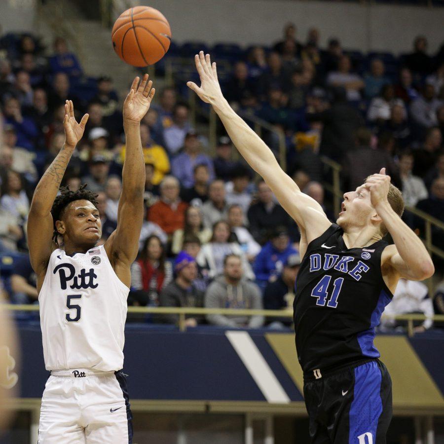 Sophomore guard Au’Diese Toney (5) attempts a 3-pointer at last year’s matchup with Duke at the Petersen Events Center.