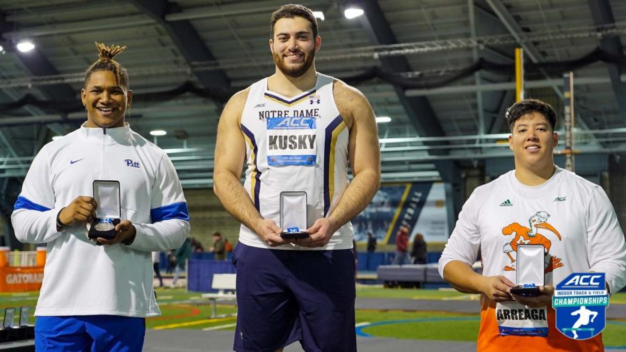 Noah Walker (left) placed second in the weight throw for Pitt at the ACC Indoor Championships Thursday at Notre Dame University. 