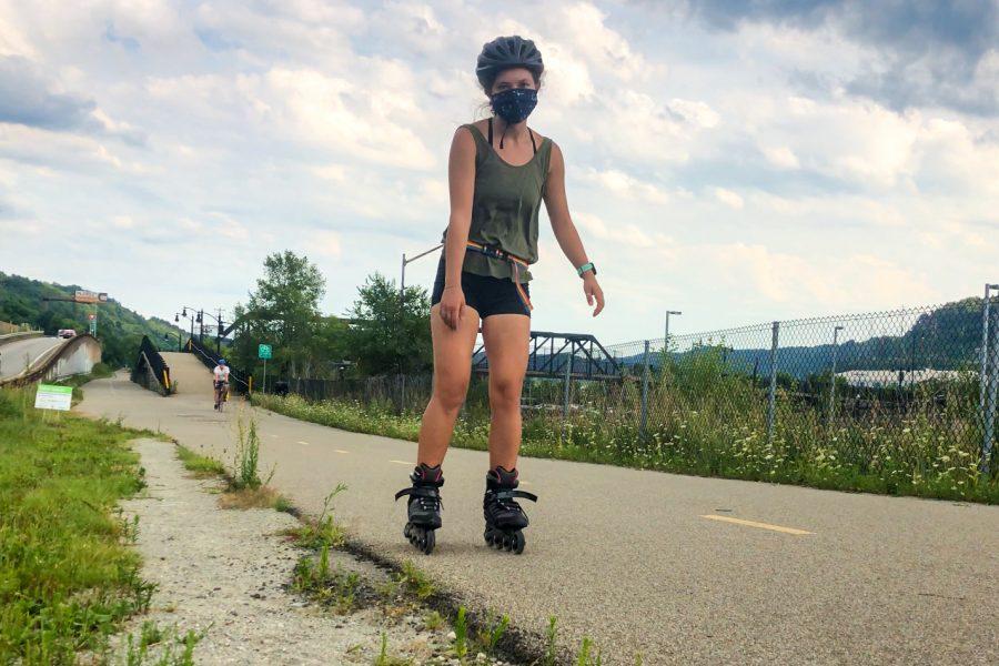 Opinions editor Leah Mensch has spent much of her free time this summer rollerblading on the South Side trail. 