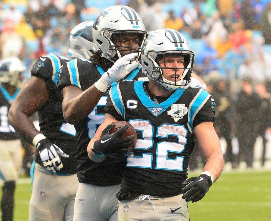 Carolina Panthers running back Christian McCaffrey (22) celebrates after scoring a touchdown against the New Orleans Saints on Dec. 29, 2019. 
