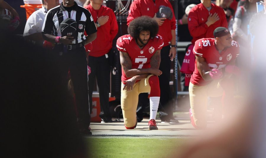 Colin Kaepernick of the San Francisco 49ers kneels for the national anthem at Levis Stadium in October 2016 in Santa Clara, California. 