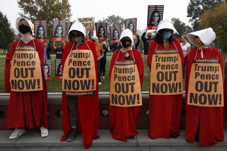Protesters and supporters of U.S. Supreme Court nominee Amy Coney Barrett rally during the Senate Judiciary Committee meeting in Capitol Hill on Oct. 22. 
