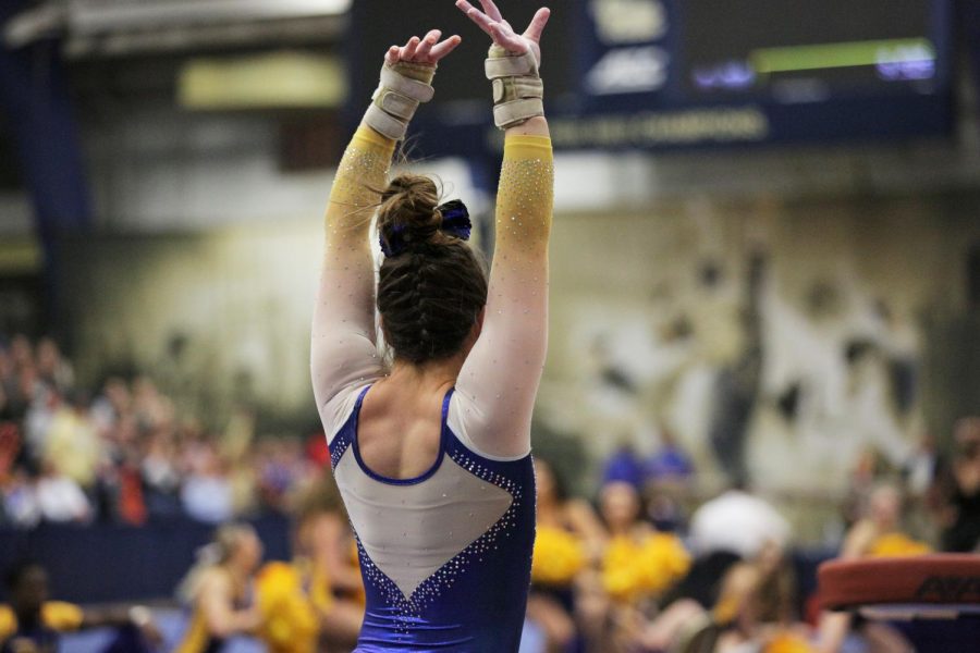 The+Pitt+Gymnastics+team+earned+its+first+victory+of+the+season+Sunday+afternoon+by+narrowly+beating+out+NC+State+and+Towson+with+a+final+score+of+195.700.+