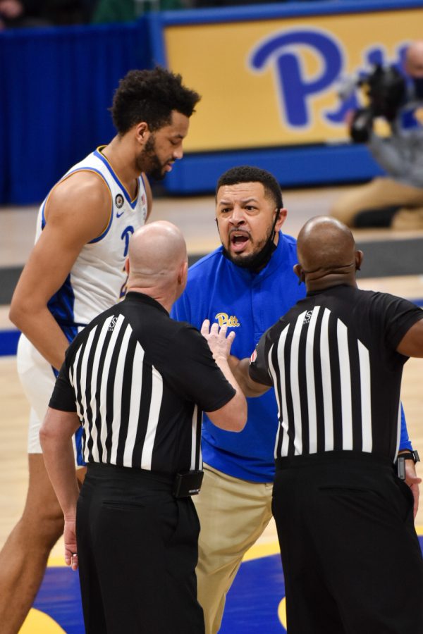 Pitt men’s basketball head coach Jeff Capel has a heated exchange with the referees during the Panthers’ game against NC State on Feb. 17.
