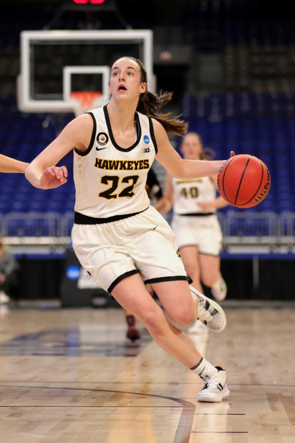 Iowas Caitlin Clark controls the ball during first-round action in the NCAA Tournament at the Alamodome on March 21, 2021, in San Antonio, Texas. 